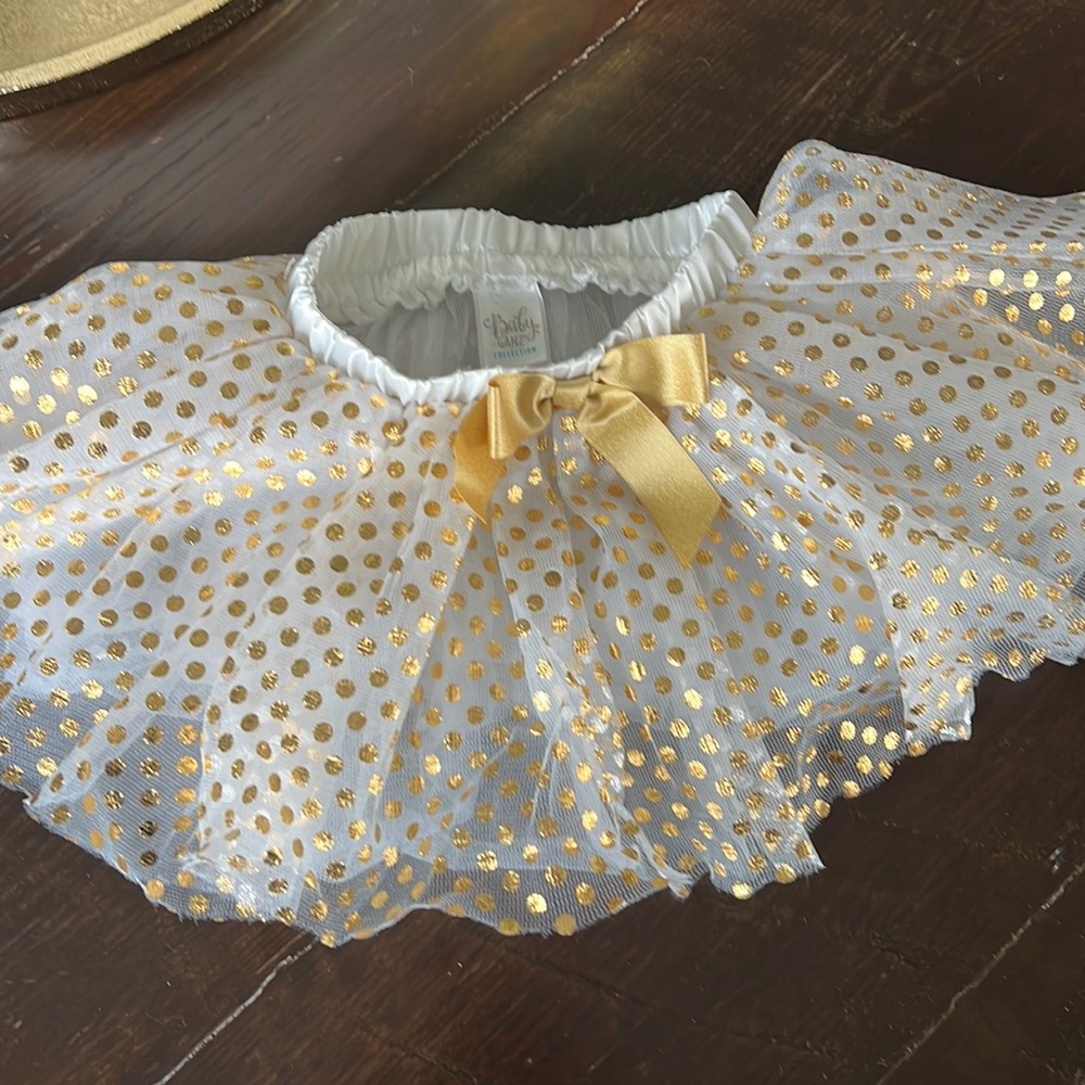 Gold and white tutu. size 0-12m